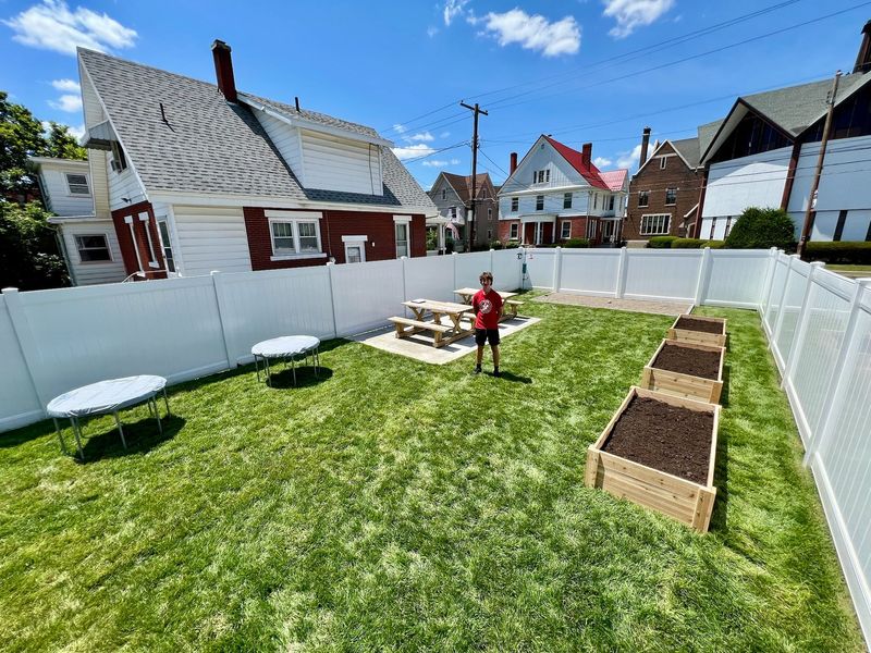 Nicholas Gray stands in the outdoor classroom he created at St. Ann's Academy in Hornell. Gray completed the classroom as an Eagle Scout project in honor of his father, Dave Gray.