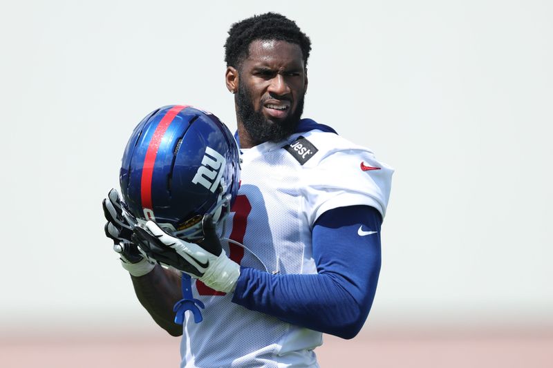 Jul 23, 2025; East Rutherford, NJ, USA; New York Giants linebacker Brian Burns (0) looks on during training camp at Quest Diagnostics Training Center. Mandatory Credit: Vincent Carchietta-Imagn Images