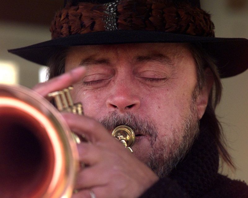Chuck Mangione plays his trumpet at the opening of the 26th annual fox hunt at Hopper Hills Hunt Club in Victor in 1997.
