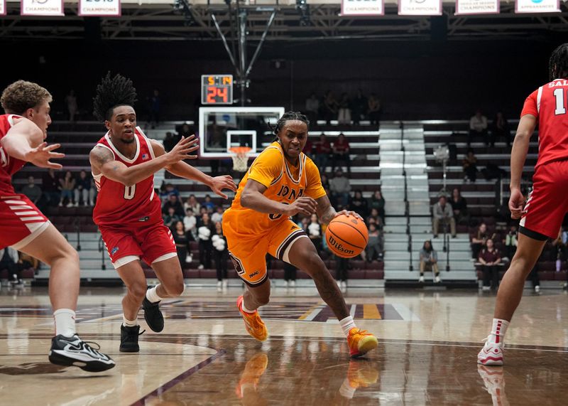 James Patterson of Iona (0) drives past Marist's Jadin Collins-Roberts (0). Marist beat Iona 70-65 on Jan 3, 2025, in New Rochelle. IONA ATHLETICS