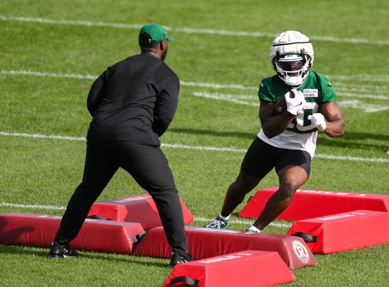 Jul 24, 2025; Florham Park, NY, USA; New York Jets running back Breece Hall (20) participates in a drill during training camp at Atlantic Health Jets Training Center. Mandatory Credit: John Jones-Imagn Images