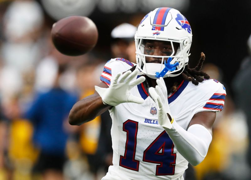 Aug 17, 2024; Pittsburgh, Pennsylvania, USA; Buffalo Bills wide receiver Deon Cain (14) warms up before a game against the Pittsburgh Steelers at Acrisure Stadium.