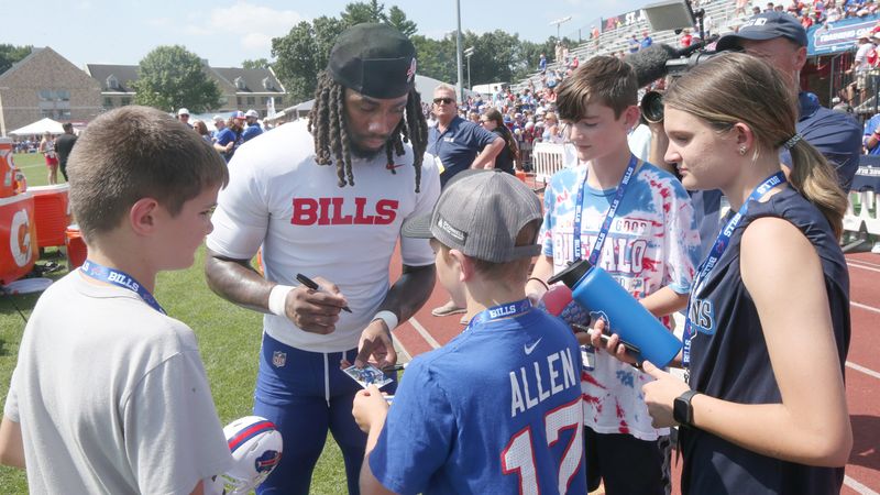Bills running back James Cook signs autographs for fans during day five of Buffalo Bills training camp at St. John Fisher University Monday, July 28, 2025 in Pittsford, NY.