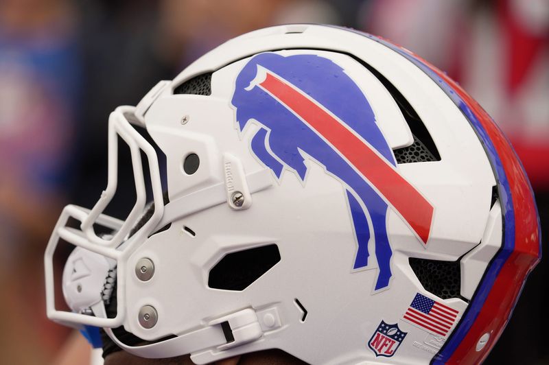 Just the helmet is showing as a player as he signs autographs for fans at Bills Training Camp at St. John Fisher University in Pittsford on July 31, 2025.
