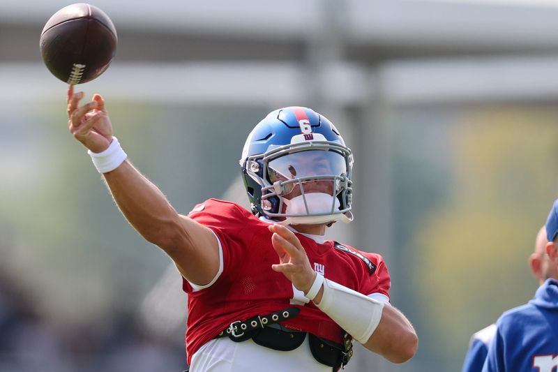 Aug 4, 2025; East Rutherford, NJ, USA; New York Giants quarterback Jaxson Dart (6) participates in drills during training camp at Quest Diagnostics Training Center. Mandatory Credit: Vincent Carchietta-Imagn Images