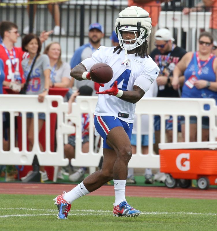 Bills running back James Cook pulls in a pass along the sideline during day three of Buffalo Bills training camp at St. John Fisher University Friday, July 25, 2025 in Pittsford, NY.