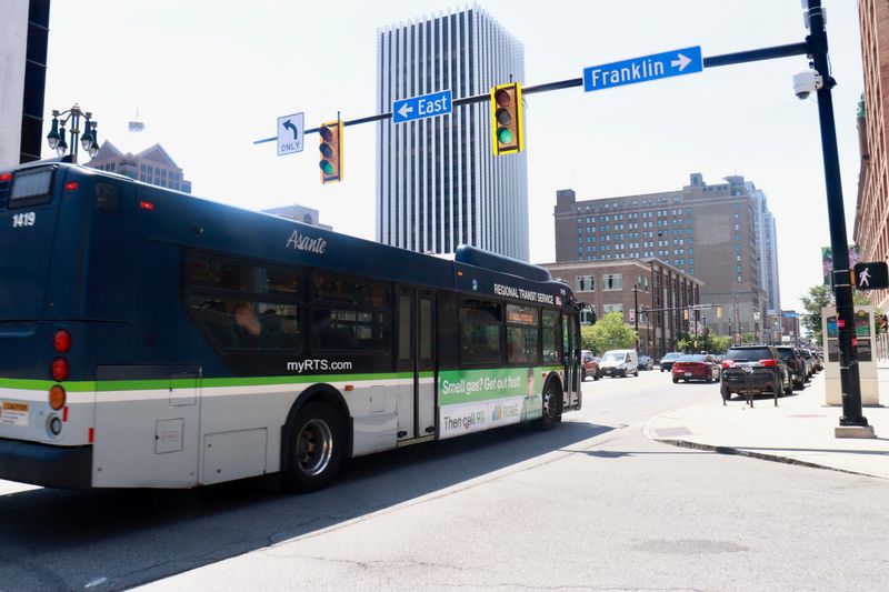 An RTS Route 8 bus approaches the Transit Center in downtown Rochester on Aug. 8, 2025.