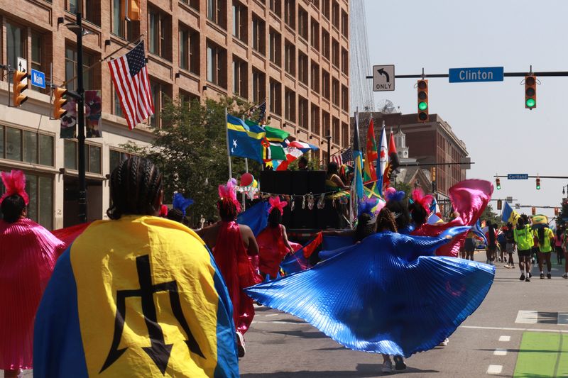 Local dance groups paraded through the streets of Rochester in colorful outfits for the 39th annual Carifest.