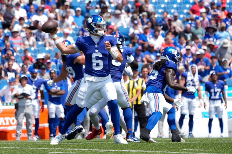 Aug 9, 2025; Orchard Park, New York, USA; New York Giants quarterback Jaxon Dart (6) throws the ball during the first half at Highmark Stadium. Mandatory Credit: Gregory Fisher-Imagn Images