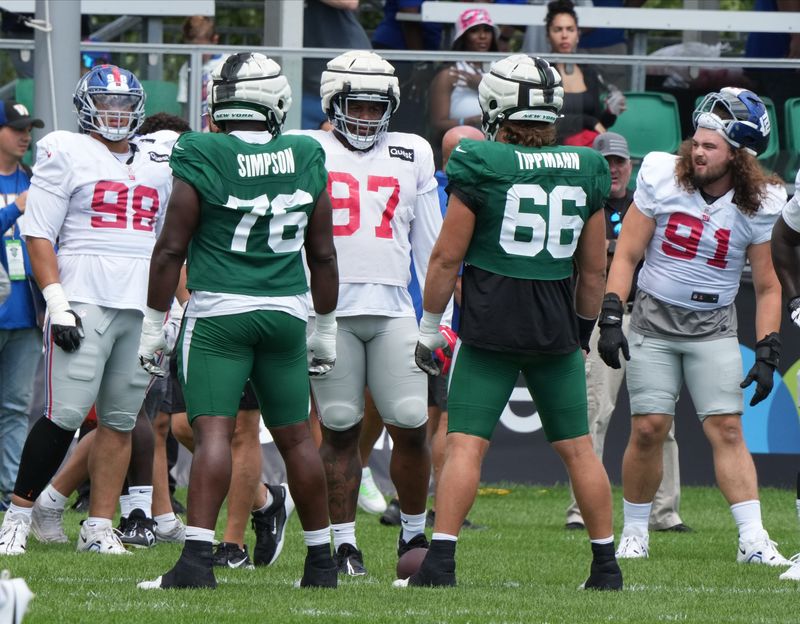 Florham Park, NJ -- August 21, 2024 -- The Giants defensive line up against the Jets offensive line during practice. The New York Giants came to the Atlantic Health Jets Training Center in Florham Park, New Jersey to take part in a joint practice with the New York Jets.