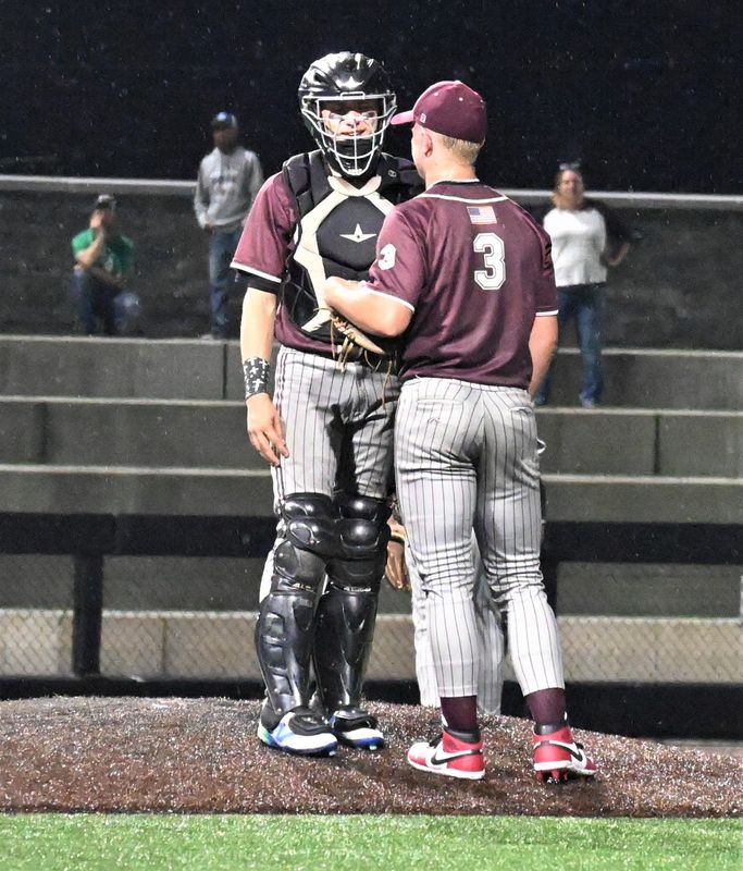 Oriskany catcher Nick Hays and pitcher Eddie Wright (3) confer on the mound at SUNY-Binghamton during their Class D state semifinal victory over Section V Fillmore.