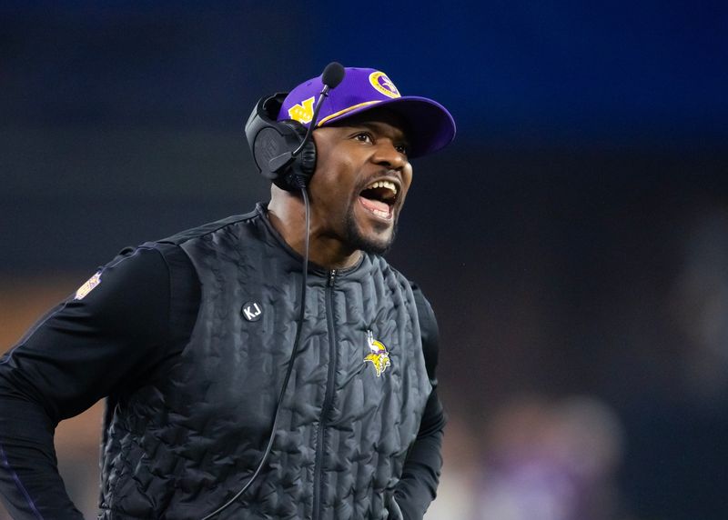 Jan 13, 2025; Glendale, AZ, USA; Minnesota Vikings defensive coordinator Brian Flores against the Los Angeles Rams during an NFC wild card game at State Farm Stadium. Mandatory Credit: Mark J. Rebilas-Imagn Images
