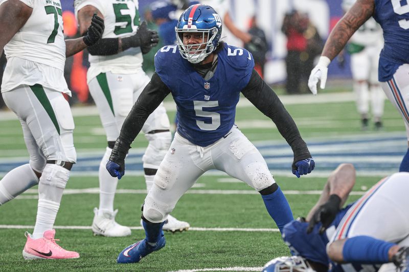 Oct 29, 2023; East Rutherford, New Jersey, USA; New York Giants linebacker Kayvon Thibodeaux (5) reacts after sacking New York Jets quarterback Zach Wilson (2) during the second half at MetLife Stadium. Mandatory Credit: Vincent Carchietta-USA TODAY Sports