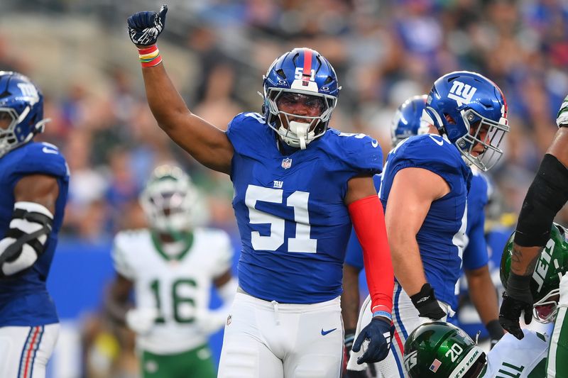 Aug 16, 2025; East Rutherford, New Jersey, USA; New York Giants linebacker Abdul Carter (51) reacts to a play against the New York Jets during the first half at MetLife Stadium. Mandatory Credit: Rich Barnes-Imagn Images