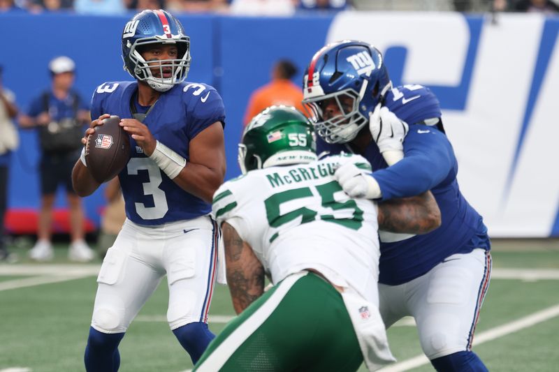 Aug 16, 2025; East Rutherford, New Jersey, USA; New York Giants quarterback Russell Wilson (3) drops back to pass during the first quarter against the New York Jets at MetLife Stadium. Mandatory Credit: Vincent Carchietta-Imagn Images
