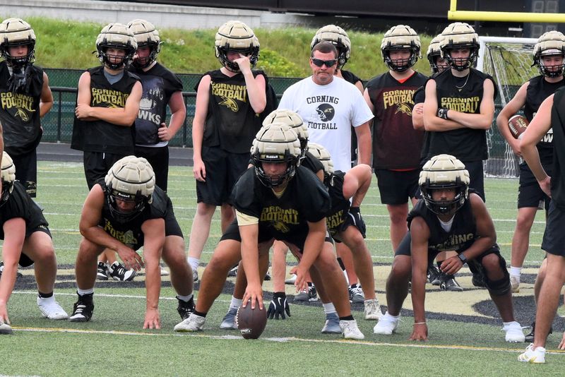 Corning head coach Mike Johnston Jr. watches his team run through a drill during practice Aug. 19, 2025 at Corning Memorial Stadium.