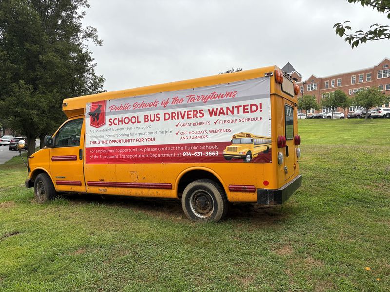 An old school bus is redeployed on Aug. 20, 2025, outside Sleepy Hollow Middle/High School on North Broadway in Sleepy Hollow to help Tarrytowns school district advertise for bus drivers as the 2025-2026 academic year approaches.