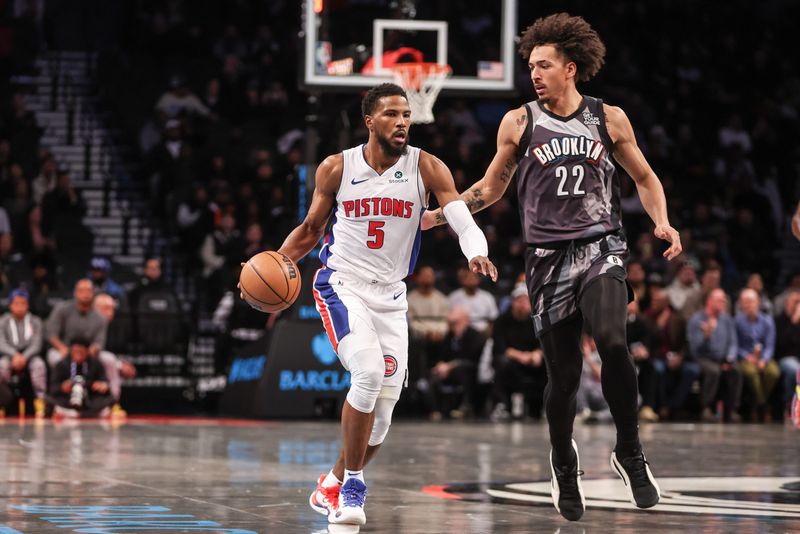 Jan 8, 2025; Brooklyn, New York, USA; Detroit Pistons guard Malik Beasley (5) looks to drive past Brooklyn Nets forward Jalen Wilson (22) in the first quarter at Barclays Center. Mandatory Credit: Wendell Cruz-Imagn Images