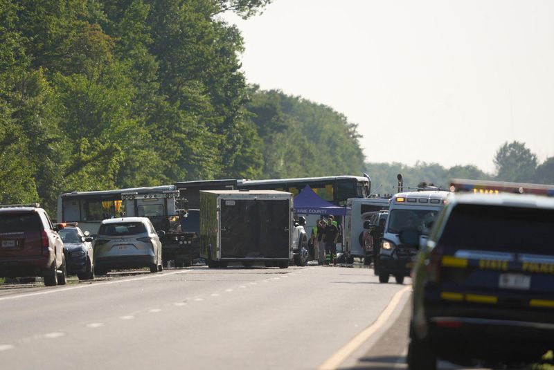 The investigation continues at the scene of a fatal tour bus crash on the New York State Thruway near Pembroke.