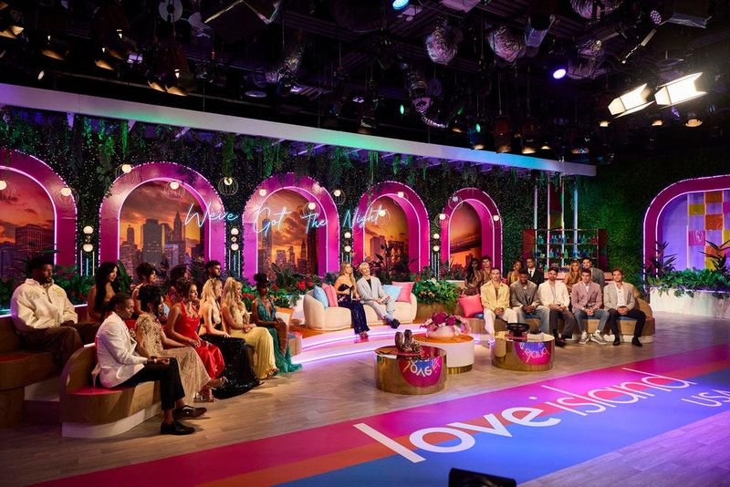 LOVE ISLAND USA -- "Reunion Special" -- Pictured: (l-r) (Top Row): Chris Seeley, Andreina Santos, Huda Mustafa, Amaya Espinal, Bryan Arenales, Ariana Madix, Andy Cohen, Olandria Carthen, Nic” Vansteenberghe, Michelle “Chelley” Bissainthe, Ace Green, Iris Kendall, Jose “Pepe” Garcia-Gonzalez, (Bottom Row): Taylor Williams, Clarke Carraway, Jaden Duggar, Gracyn Blackmore, Savanna “Vanna” Einerson, Courtney “CoCo” Watson, Elan Bibas, JD Dodard, Zac Woodworth, Austin Shepard, Thomas John “TJ” Palma -- (Photo by: Jocelyn Prescod/PEACOCK)