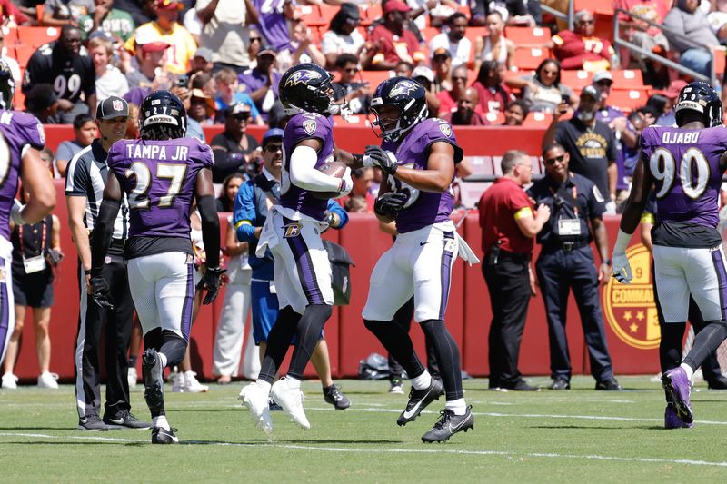 Aug 23, 2025; Landover, Maryland, USA; Baltimore Ravens running back Myles Gaskin (38) and safety Beau Brade (25) celebrate after scoring a touchdown in the second quarter against the Washington Commanders at Northwest Stadium. Mandatory Credit: Jordyn Harris-Imagn Images