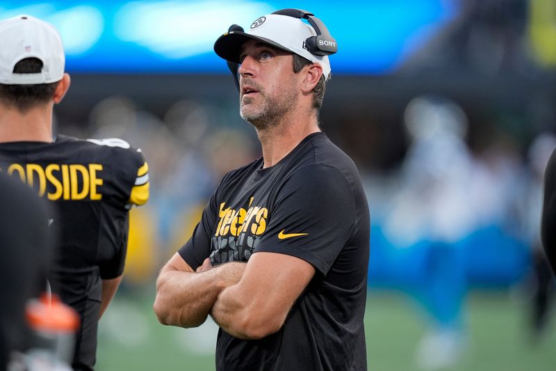 Aug 21, 2025; Charlotte, North Carolina, USA; Pittsburgh Steelers quarterback Aaron Rodgers (8) during the first quarter Carolina Panthers at Bank of America Stadium. Mandatory Credit: Jim Dedmon-Imagn Images
