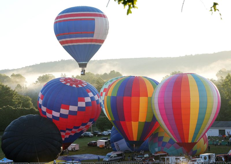 Hot air balloons fill the sky during the morning launches of the 34th-annual Hudson Valley Hot-Air Balloon Festival at Tymor Park in Union Vale Aug. 30 & 31, 2025. The festival, presented by JP Morgan Chase, featured tethered hot-air balloon rides, full hot air balloon flights, morning yoga, fireworks, live music and entertainment, food trucks, a beer and wine tent, local vendors, and many other family activities.