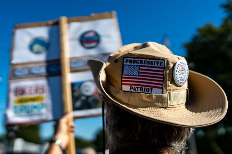 Tim Williams, 60, from Homeworth, Ohio, participates in the Workers Over Billionaires Labor Day Rally organized by the May Day Strong organization, Sept. 1, 2025, along Kent Road in Stow, Ohio.