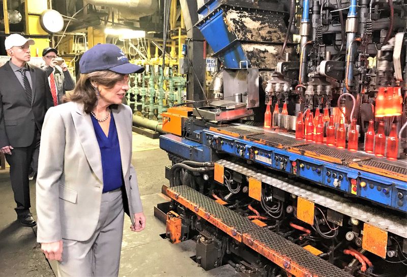 Then-Lt. Gov. Kathy Hochul watches glass bottles being made at Anchor Glass on McCann's Boulevard in Elmira Heights during a 2020 visit.