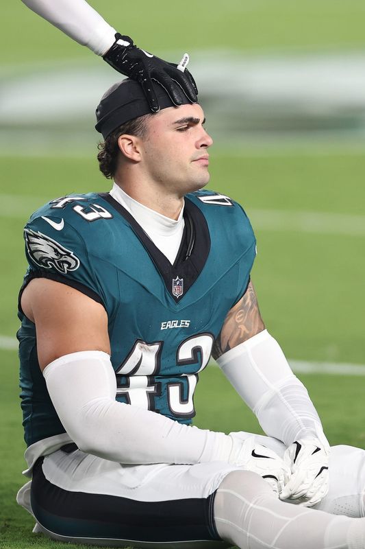 Ben VanSumeren sits on the field in Philadelphia after suffering a knee injury on the first play of the 2025 NFL season.