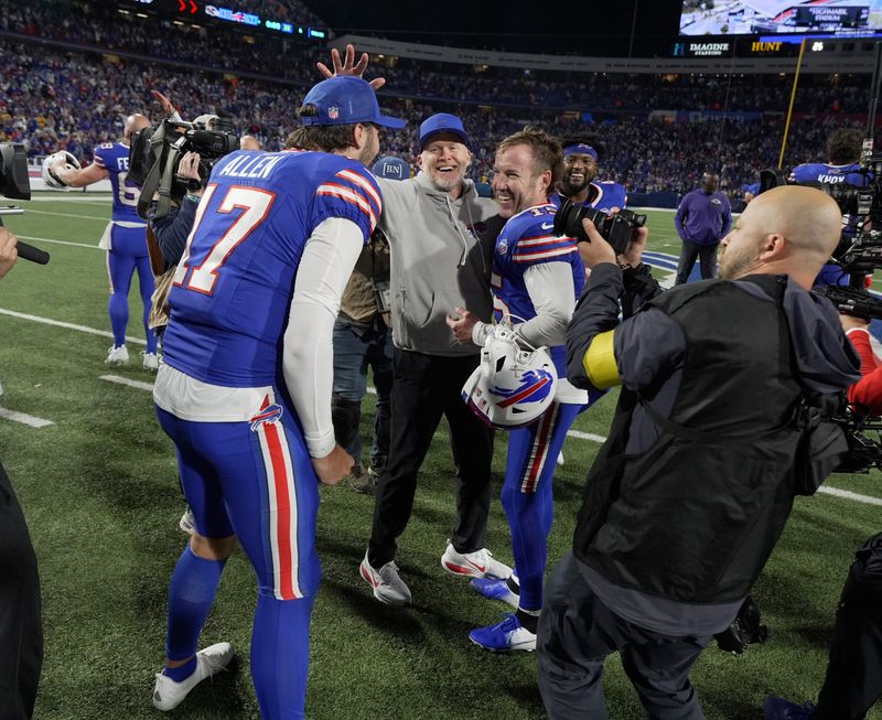 Buffalo Bills quarterback Josh Allen celebrates with head coach Sean McDermott and Matt Prater who won the game with his successful field goal against the Baltimore Ravens at Highmark Stadium in Orchard Park on Sept. 7, 2025.