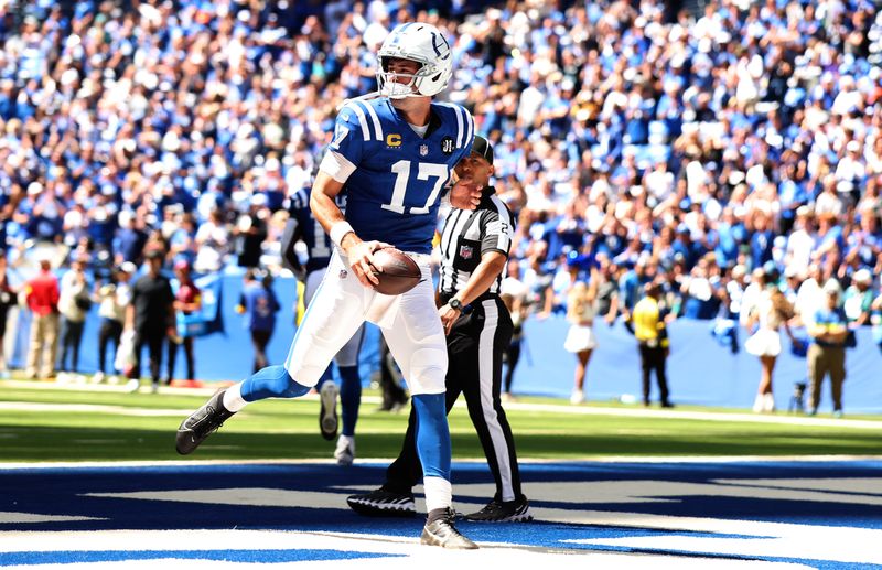 Sep 7, 2025; Indianapolis, Indiana, USA; Indianapolis Colts quarterback Daniel Jones (17) celebrates after a touchdown during the first half at Lucas Oil Stadium. Mandatory Credit: Trevor Ruszkowski-Imagn Images