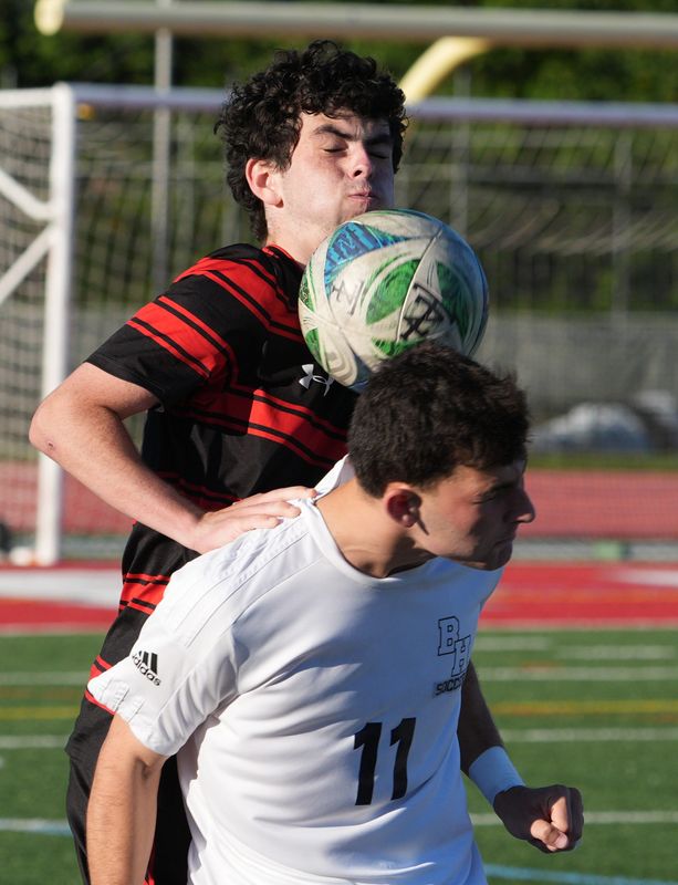 Tappan Zee's Thomas McKenna, top, goes up for the ball with Byram Hills' Ryan Pero during their game at Tappan Zee Sept. 8, 2025. The game ended in a 0-0 tie.