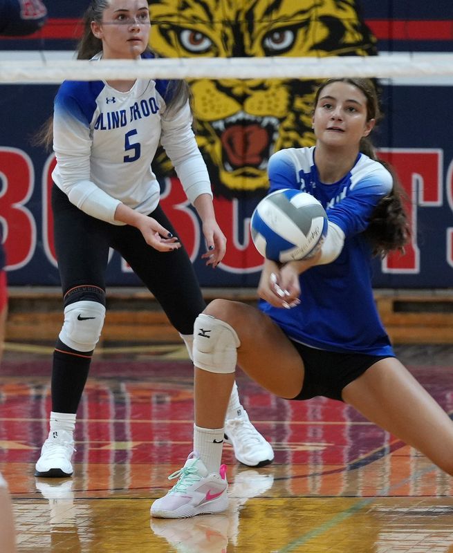 Blind Brook’s Annabel Rosenfeld (8) returns a shot against Byram Hills during girls volleyball action at Byram Hills High School in Armonk Sept. 11, 2025.
