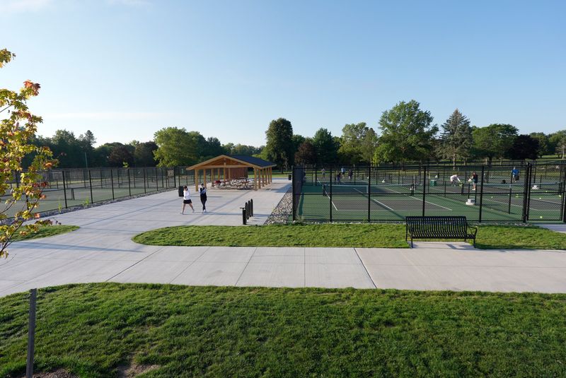 A few pickleball courts at Shadow Pines in Penfield on Sept. 16, 2025 were busy in the early morning. An explosion at the Dolomite Quarry across from the park on Whalen Road on Sept. 15, 2025 sent rocks into Shadow Pines near the playground and pickleball courts. No one was injured.