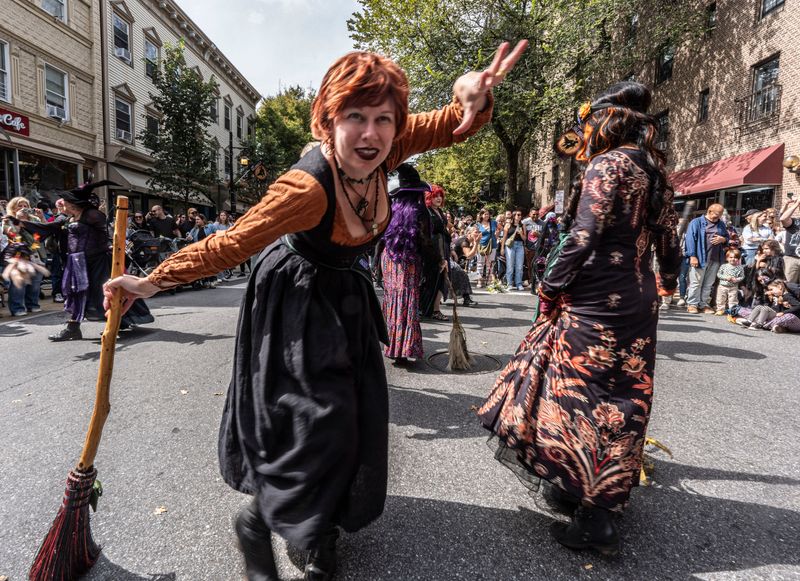 Members of Witches Along the Hudson, a theatrical dance group perform during the Sleepy Hollow Street Fair Sept. 21, 2025. Approximately 20,000 people and 130 vendors filled Beekman Ave. for the annual festival that kicks off the Halloween season. The fair included arts, crafts, food, games, music, and Halloween themed entertainment.
