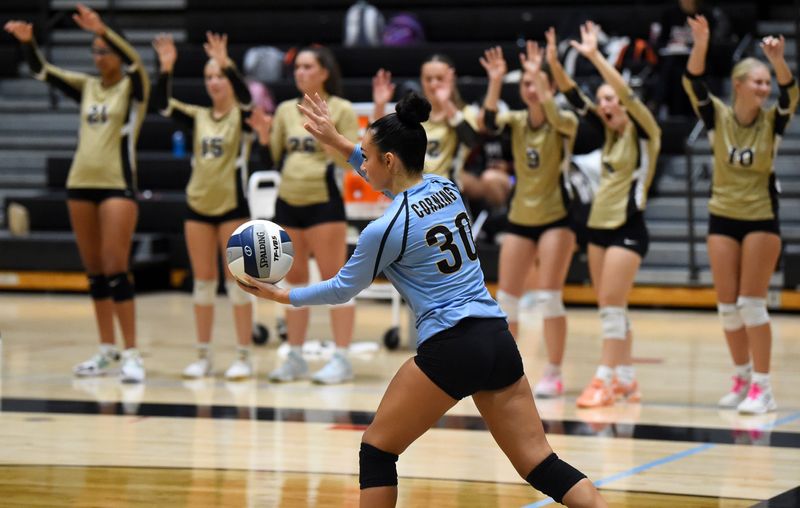 Corning's Bella Gonzalez gets set to serve during a 3-0 win over Elmira in girls volleyball Sept. 25, 2025 at Corning-Painted Post High School.