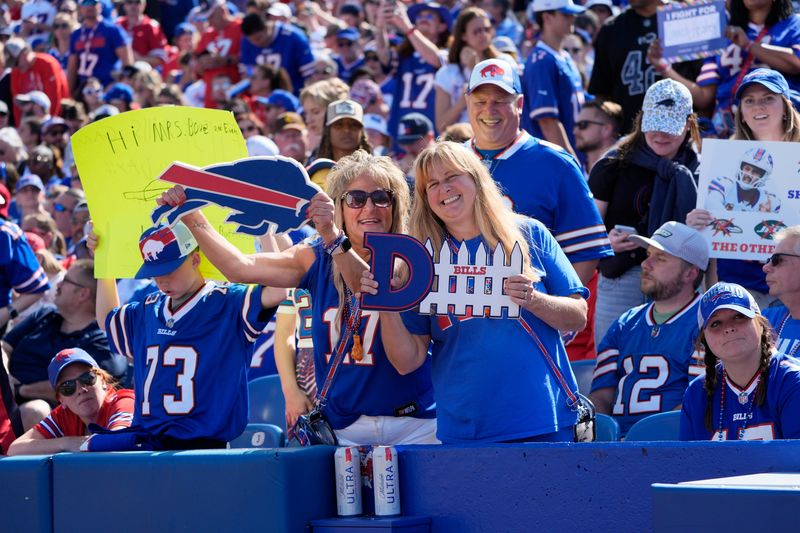 Buffalo Bills fans cheer during the first quarter against the New Orleans Saints at Highmark Stadium.