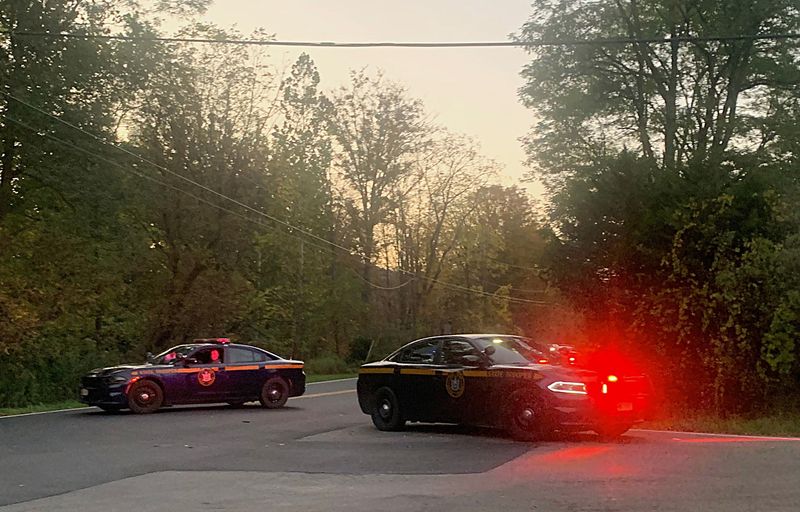 State police cars block off Rotary Road near the intersection with West Drybrook Road in the Town of Chemung on Sept. 28, 2025, after what New York State Police report as a fatal trooper-involved shooting at a residence on that road.