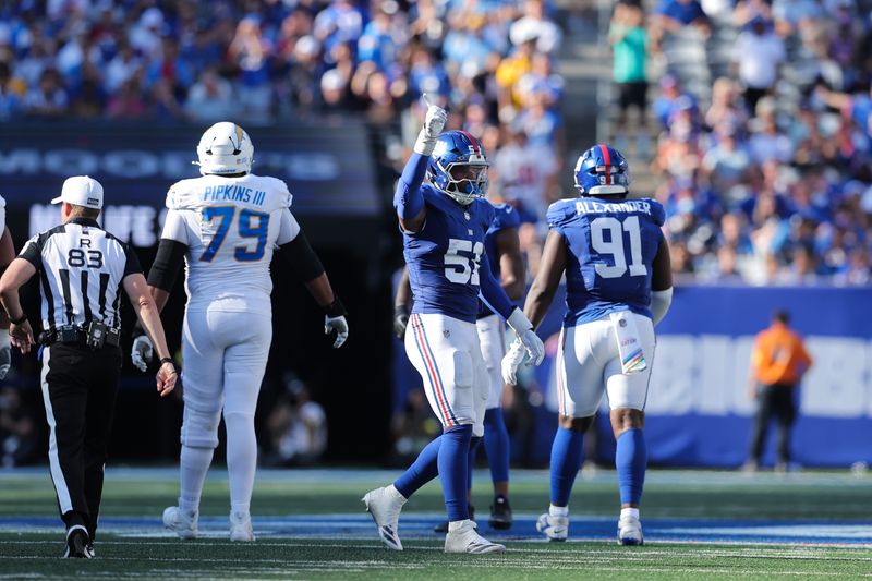 Sep 28, 2025; East Rutherford, New Jersey, USA; New York Giants linebacker Abdul Carter (51) reacts after a play during the fourth quarter against the Los Angeles Chargers at MetLife Stadium. Mandatory Credit: Brad Penner-Imagn Images