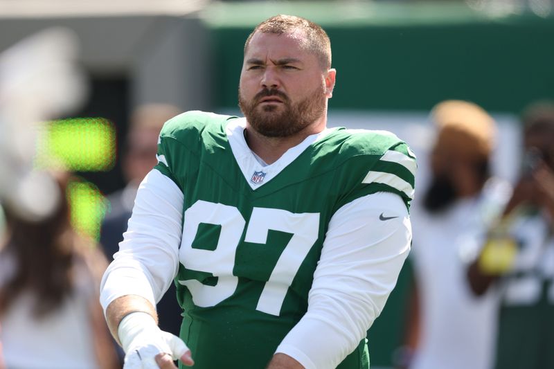 Sep 14, 2025; East Rutherford, New Jersey, USA; New York Jets defensive tackle Harrison Phillips (97) before the game against the Buffalo Bills at MetLife Stadium. Mandatory Credit: Vincent Carchietta-Imagn Images
