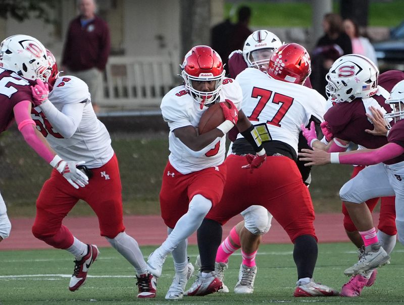 North Rockland's Christopher Norman (9) with the carry during football action against Scarsdale at Scarsdale High School on Friday, October 3, 2025. North Rockland won 19-14.