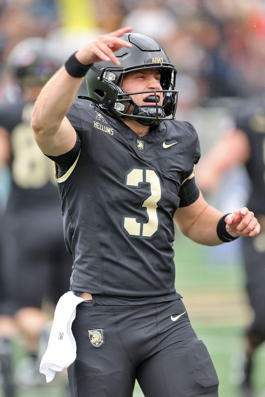 Oct 11, 2025; West Point, New York, USA; Army Black Knights quarterback Cale Hellums (3) celebrates his touchdown against the Charlotte 49ers during the first half at Michie Stadium. Mandatory Credit: Danny Wild-Imagn Images