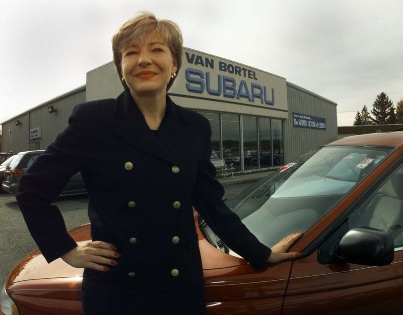 Kitty Van Bortel, owner of Van Bortel Subaru in Victor, Ontario County, stands Oct. 21, 1997, in front of her business, which that year was one of the fastest-growing private companies in the Rochester area.
