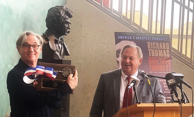 Actor Richard Thomas shows off a key to the city presented to him by Elmira Mayor Dan Mandell during a news conference at the Clemens Center on Tuesday, Oct. 14, 2025. Thomas was in town for two performances of Mark Twain Tonight!