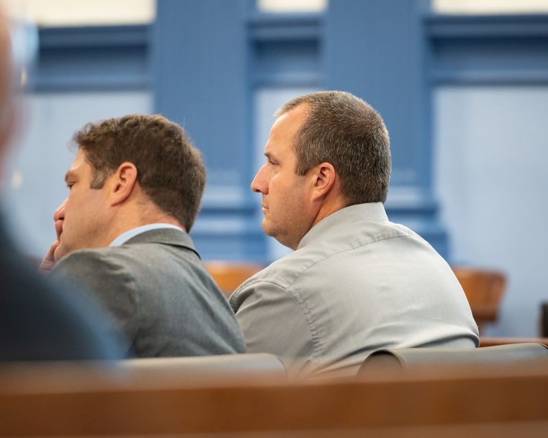 Attorney Luke Nebush and David Kingsley watches on during closing statements inside the Oneida County Courthouse in Utica, NY on Wednesday, October 15, 2025.