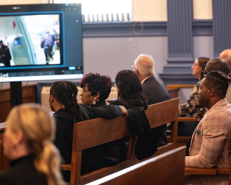 The family of Robert Brooks watches on during closing statements inside the Oneida County Courthouse in Utica, NY on Wednesday, October 15, 2025.