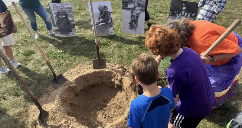 Residents from Rochester's Corn Hill neighborhood at a Sept. 27 commemorative planting along the Genesee River of the Eastern White Pine, a symbol of peace for the Iroquois, or Haudenosaunee, Confederacy.