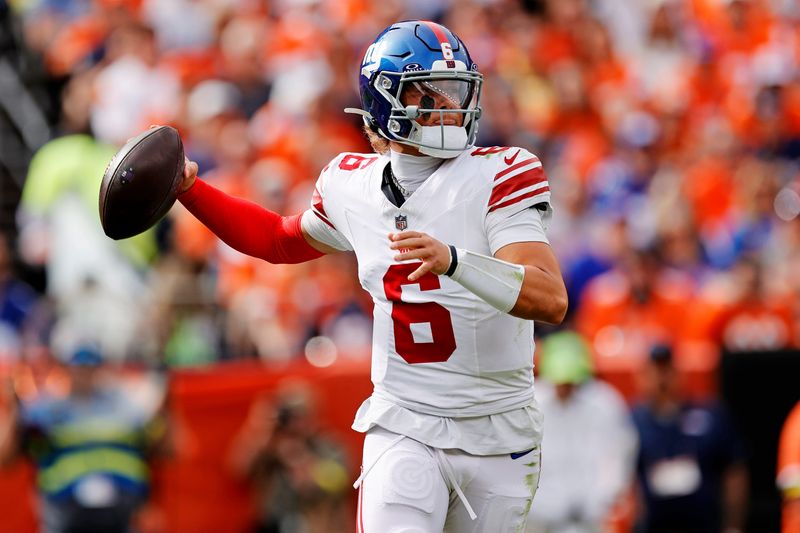 Oct 19, 2025; Denver, Colorado, USA; New York Giants quarterback Jaxson Dart (6) makes a pass during the first half against the Denver Broncos at Empower Field at Mile High. Mandatory Credit: Isaiah J. Downing-Imagn Images