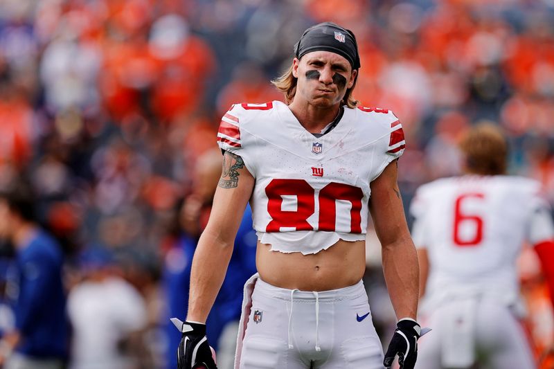 Oct 19, 2025; Denver, Colorado, USA; New York Giants wide receiver Gunner Olszewski (80) warms up before the game against the Denver Broncos at Empower Field at Mile High. Mandatory Credit: Isaiah J. Downing-Imagn Images